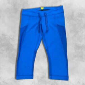 Lululemon Capri Leggings Mesh Medium Rise Drawstrings Waistband Vibrant Blue W M